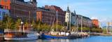 Buildings and boats at Helsinki, Finland&#039;s Old Town pier